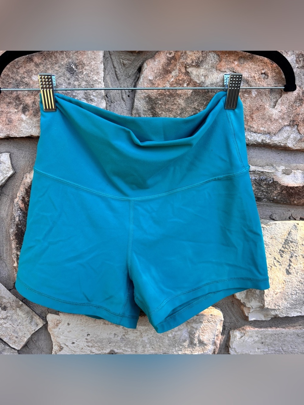 bright teal TnaBreathe high-rise athletic shorts size medium